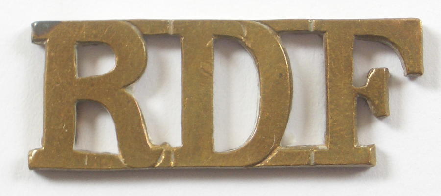 RDF Royal Dublin Fusiliers pre 1922 brass shoulder title