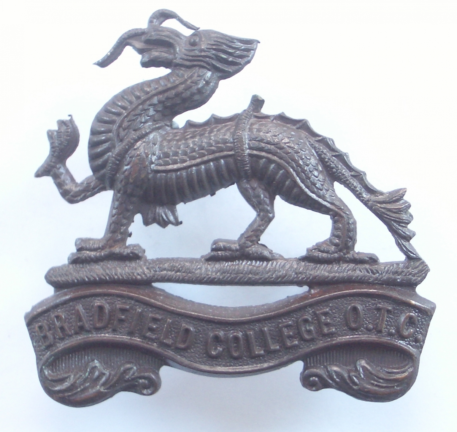 Bradfield College OTC bronze cap badge