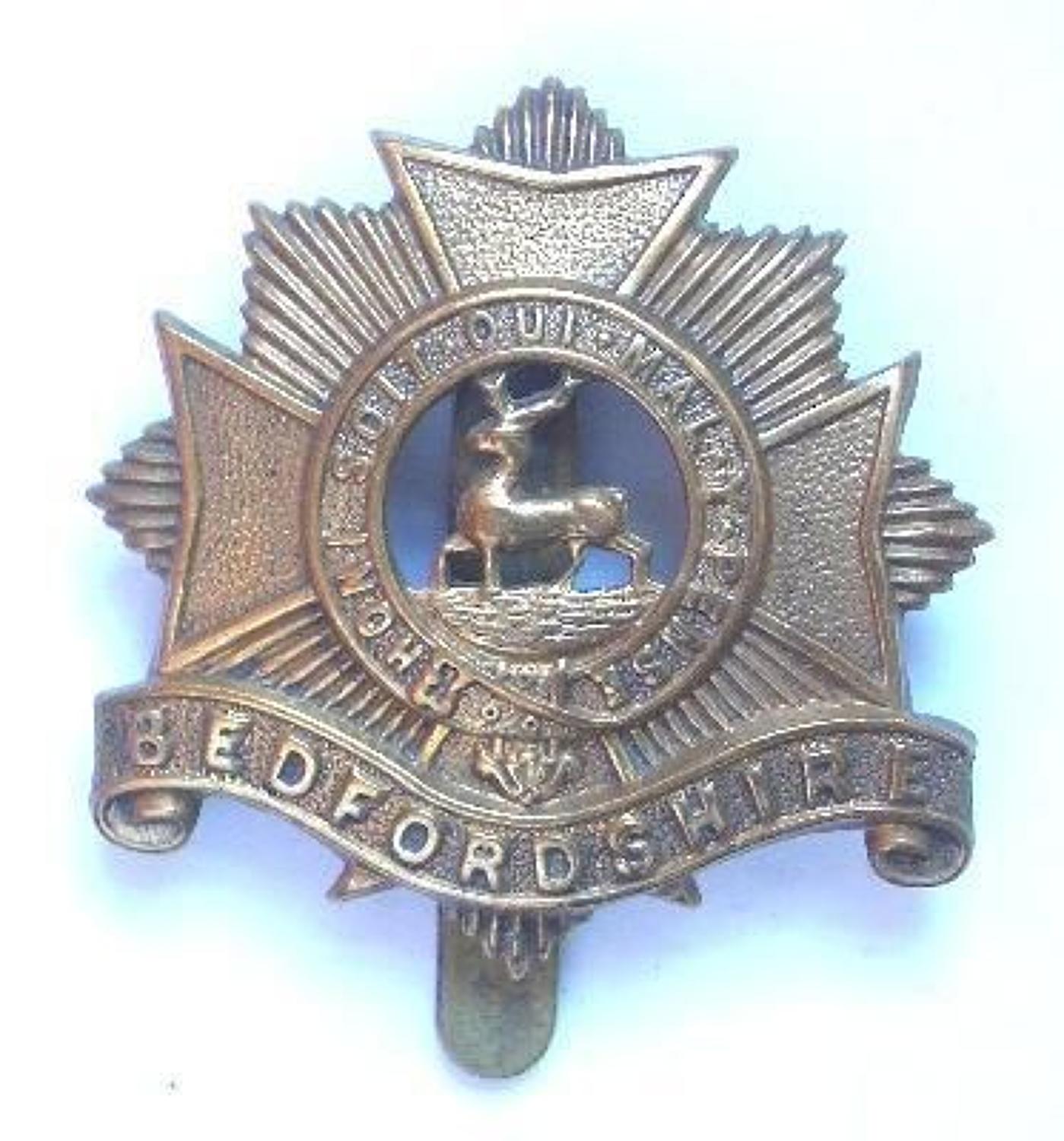 Bedfordshire Regiment 1916 all brass economy cap badge.