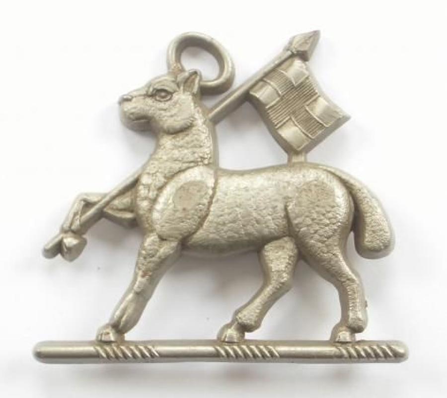 The Queen&rsquo;s Royal Regt (West Surrey) WW2 plastic economy cap badge.