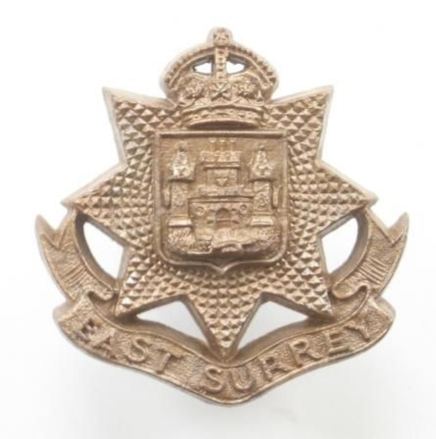 East Surrey Regiment WW2 plastic economy cap badge.