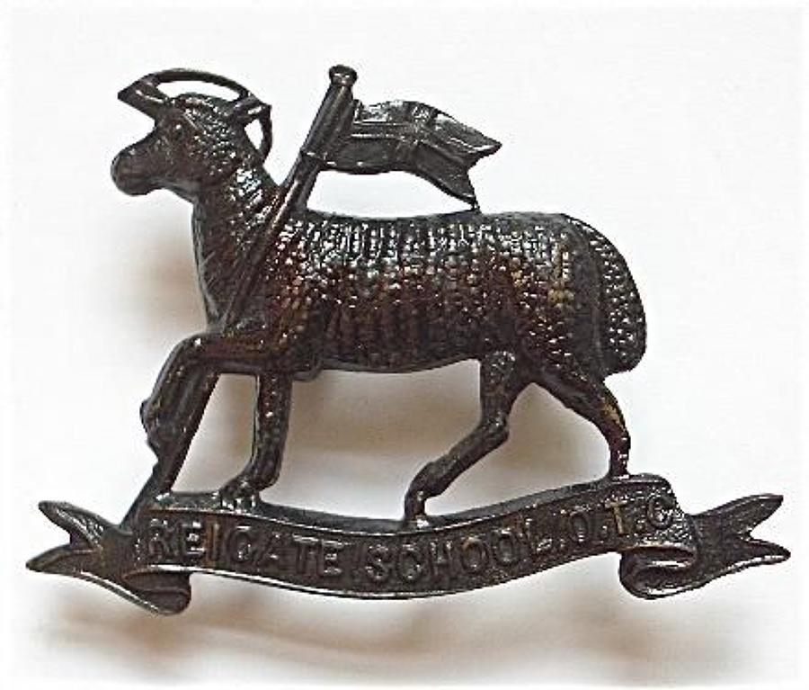 Reigate School, Surrey OTC blackened brass cap badge.