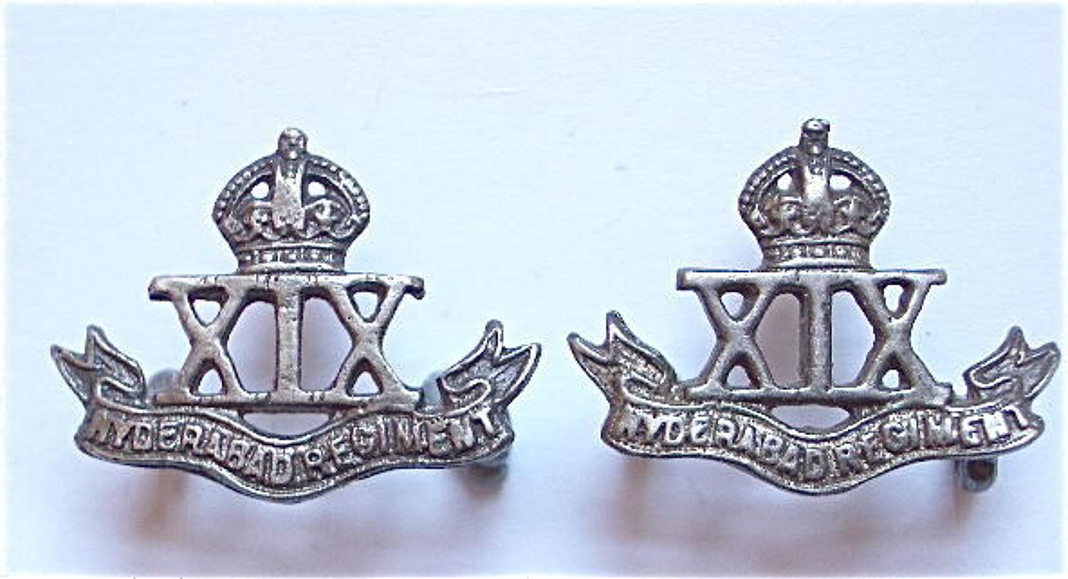 Indian Army. 19th Hyderabad Regiment pair of collar badges.