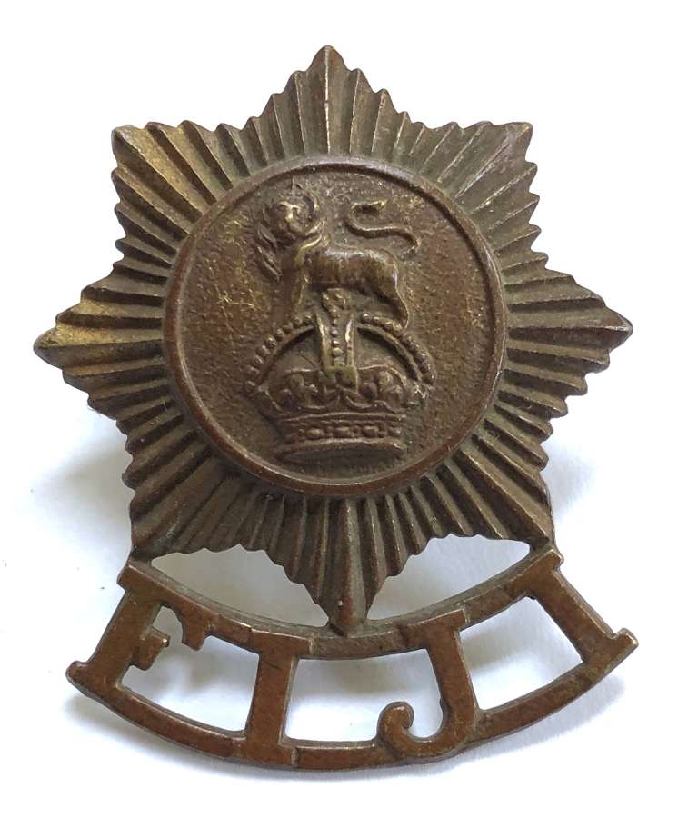 Fiji Defence Force brass cap badge with JR Gaunt, London