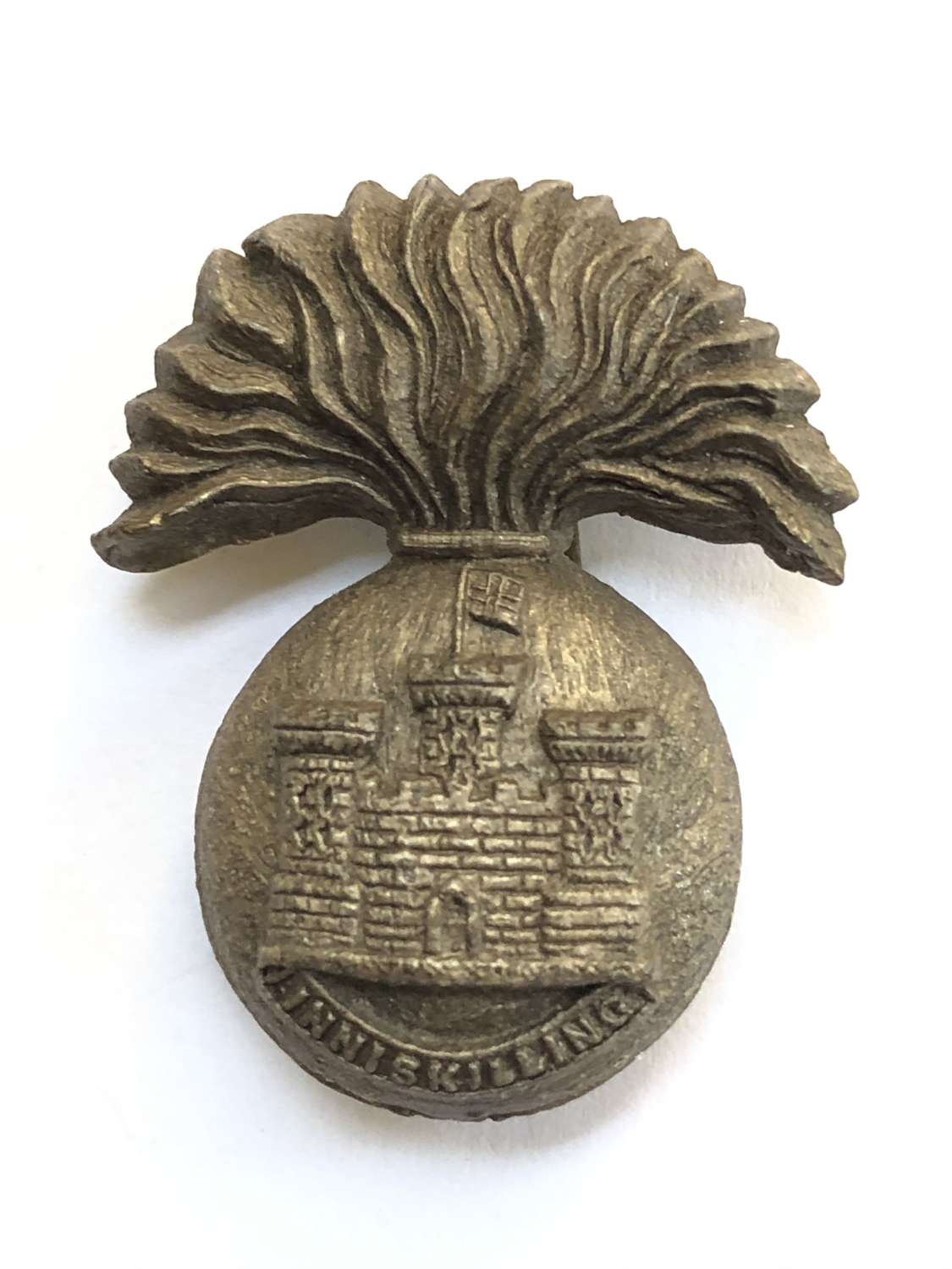 Irish. Royal Inniskilling Fusiliers WW2 plastic economy cap badge