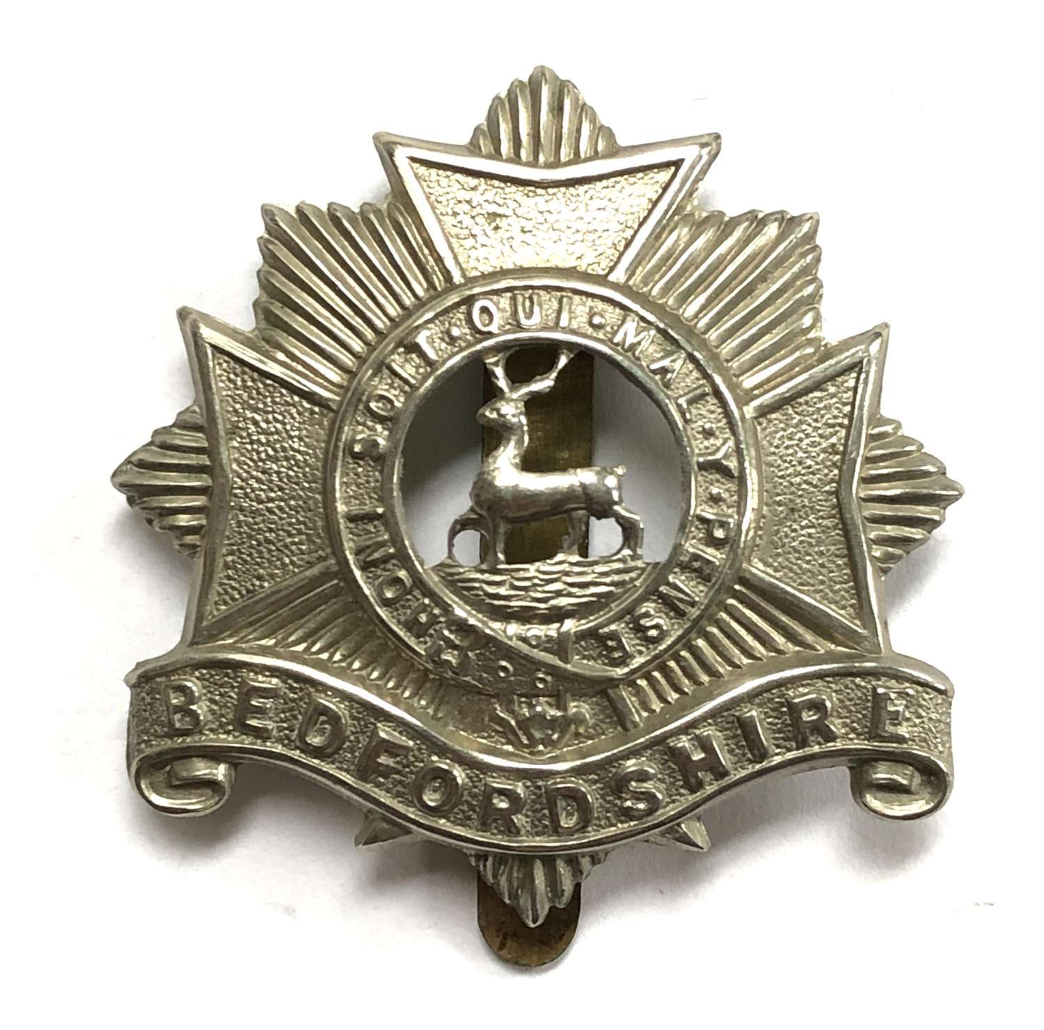 Bedfordshire Regiment pre 1919 white metal cap badge