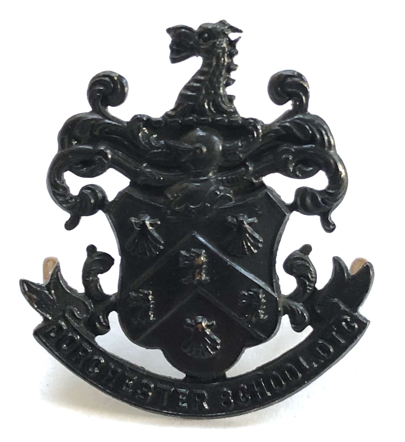 Dorchester School OTC blackened brass cap badge.