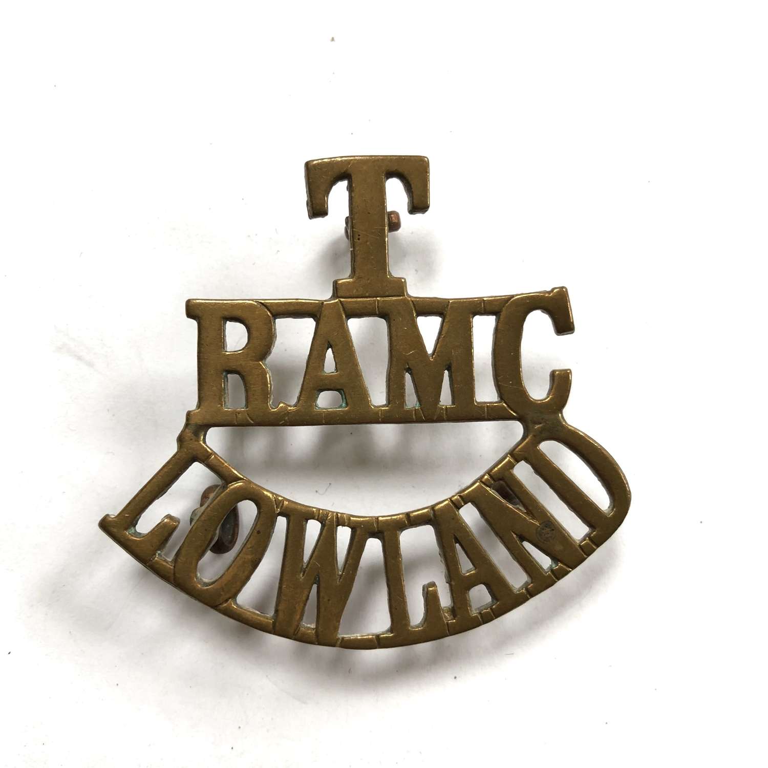 T / RAMC / LOWLAND brass shoulder title c1908-21