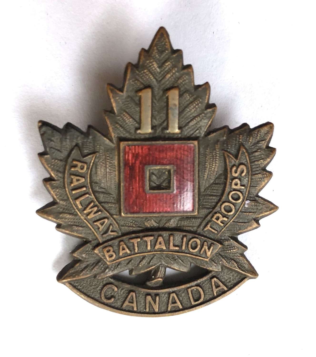 11th Canadian Railway Troops WW1 cap badge by Hicks, London