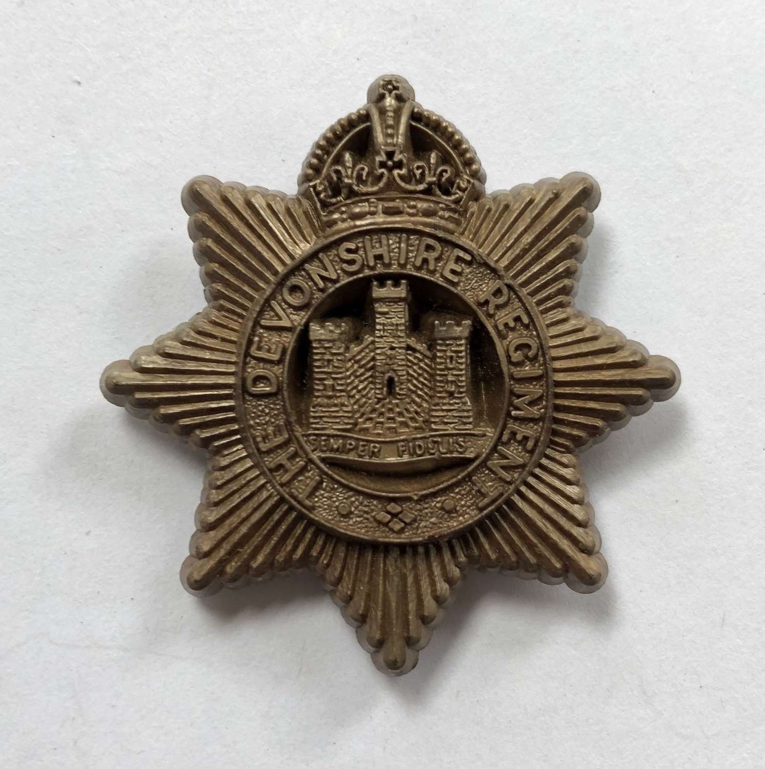 Devonshire Regiment WW2 plastic economy cap badge by A Stanley & Sons