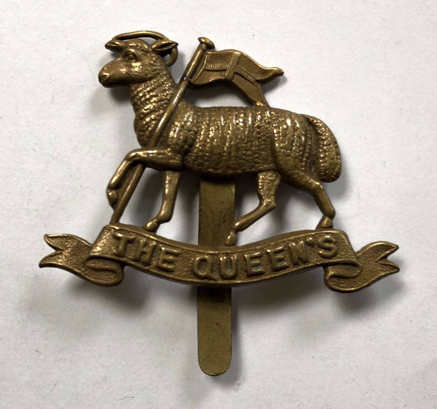 Queen’s Royal West Surrey Regiment 1916 brass economy cap badge