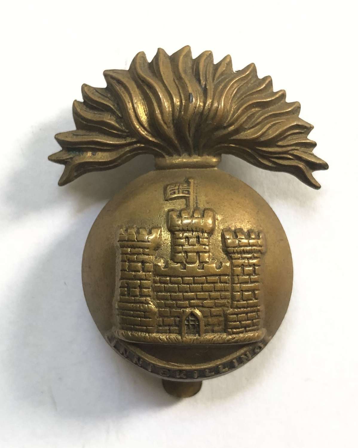 Irish. Royal Inniskilling Fusiliers 1916 brass economy cap badge