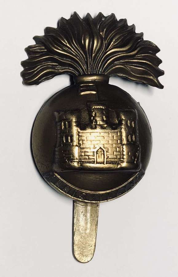 Irish. Royal Inniskilling Fusiliers 1916 brass economy cap badge
