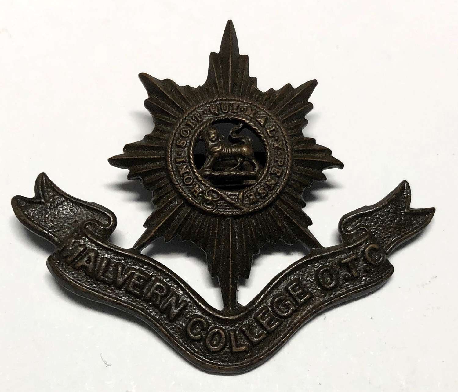 Malvern College OTC OSD cap badge.