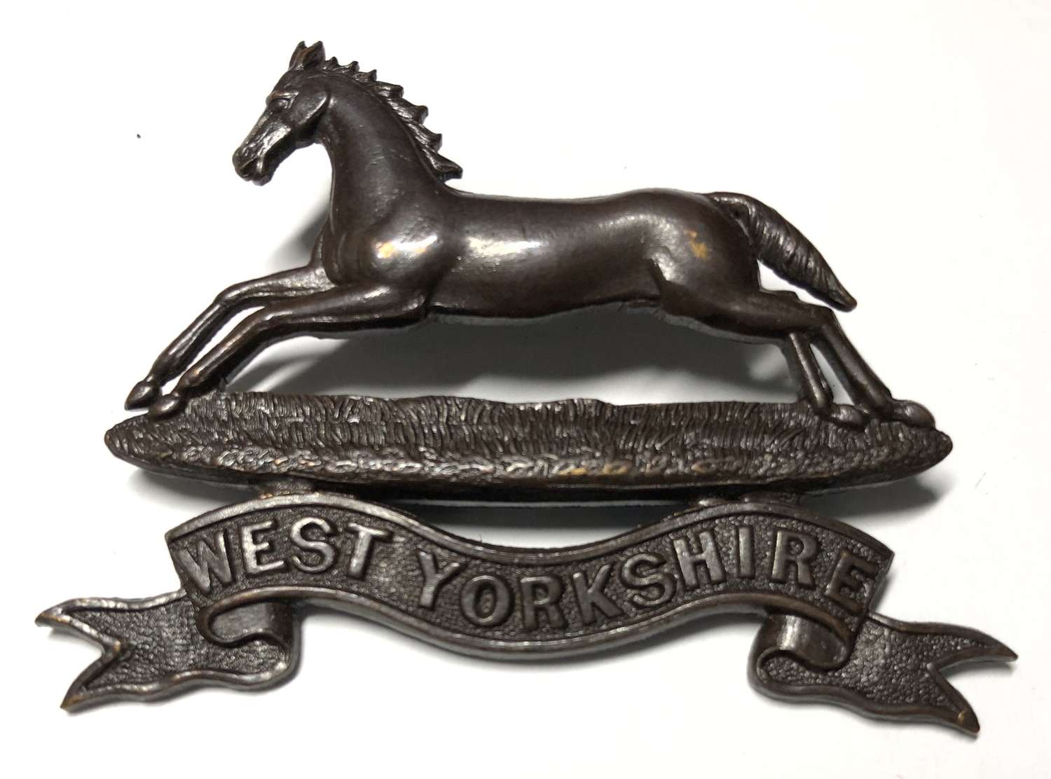 West Yorkshire Regiment post 1902 OSD cap badge.