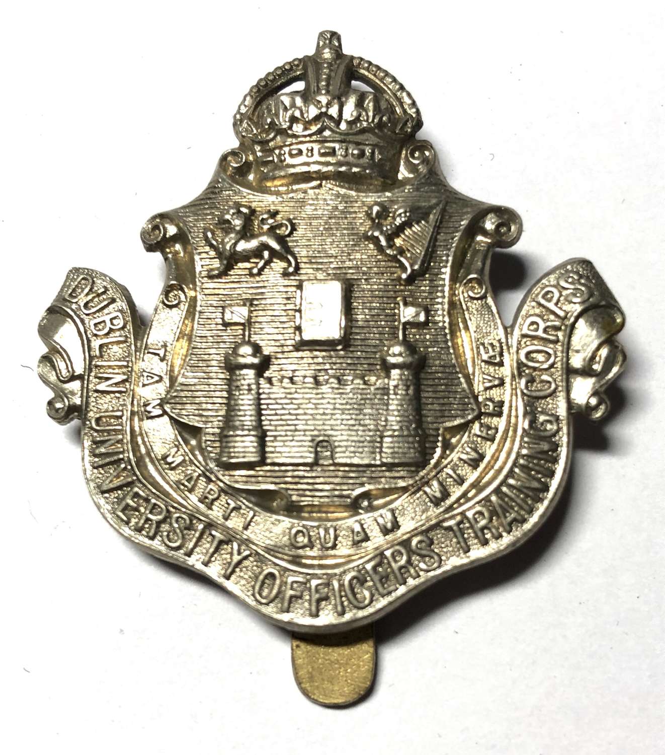 Irish. Dublin University OTC white metal cap badge circa 1910-22