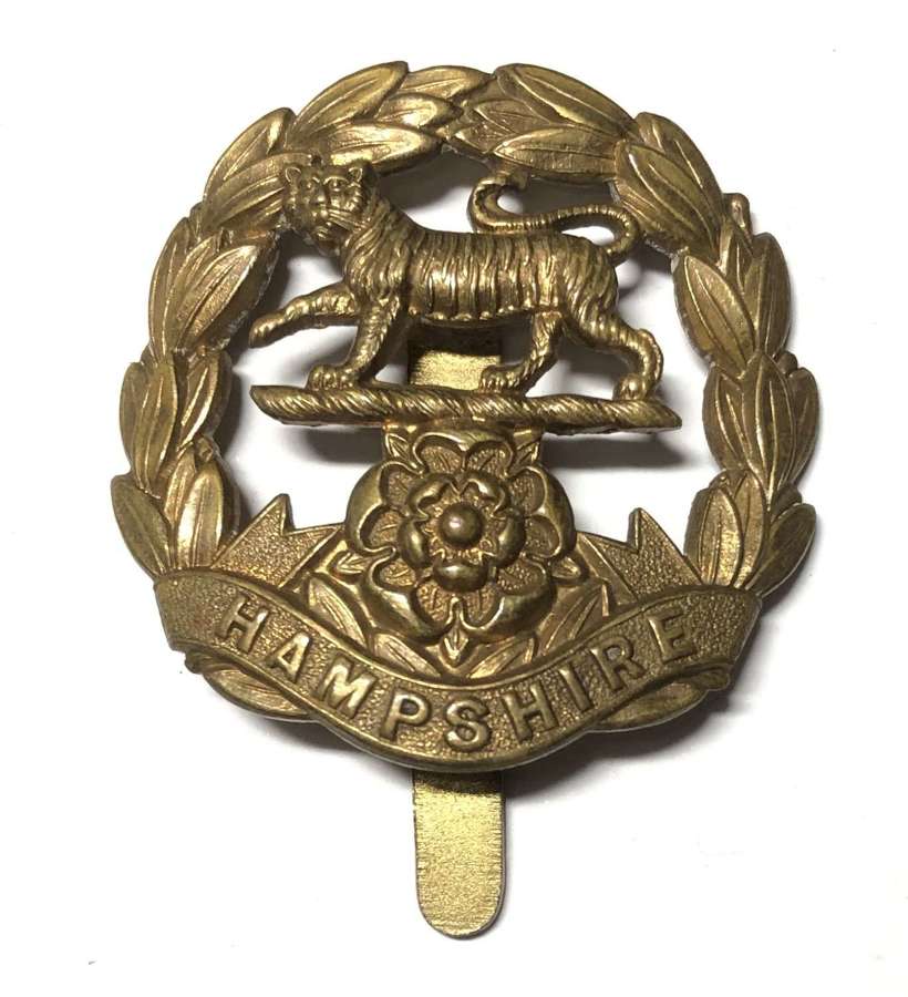 Hampshire Regiment 1916 brass economy cap badge.