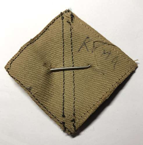 Perak Home Guard Malaya Emergency cap badge on coloured flash